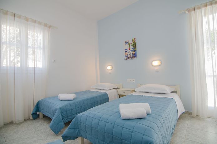 Imagen de la habitación del Hotel Athena Rooms. Foto 11