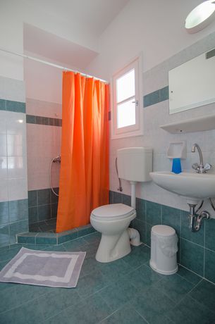 Imagen de la habitación del Hotel Athena Rooms. Foto 13