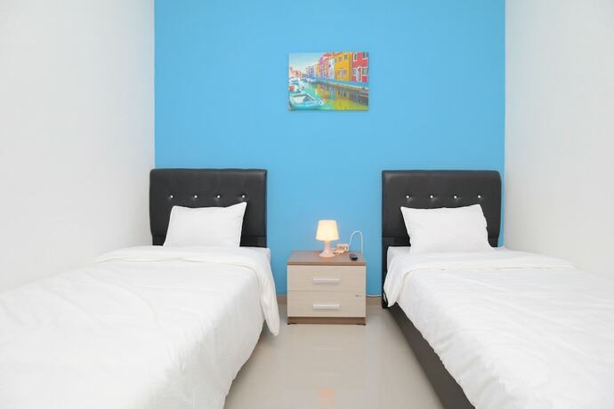 Imagen de la habitación del Hotel Athena Syariah Residence. Foto 13