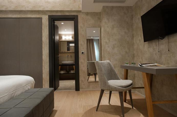 Imagen de la habitación del Hotel Athenaeum Grand. Foto 7