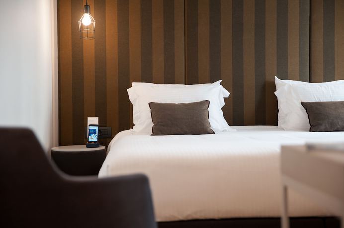 Imagen de la habitación del Hotel Athenaeum Smart. Foto 2