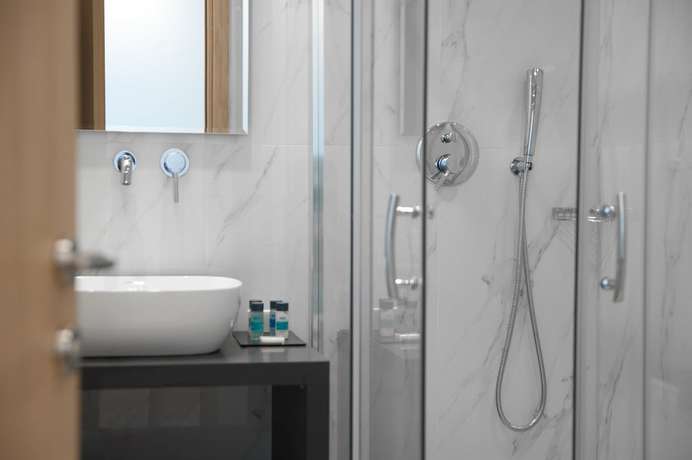 Imagen de la habitación del Hotel Athenaeum Smart. Foto 12