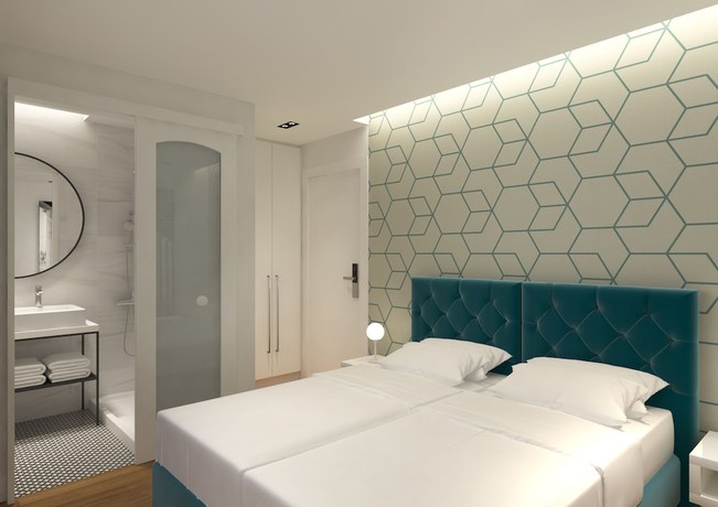 Imagen de la habitación del Hotel Athenian Montaza Hotel. Foto 15