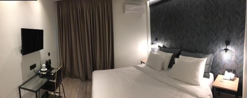 Imagen de la habitación del Hotel Athens Coast. Foto 6