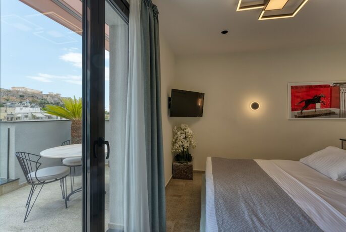 Imagen de la habitación del Hotel Athens Ivy Suites. Foto 11