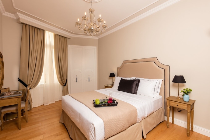 Imagen de la habitación del Hotel Athens Mansion Luxury Suites. Foto 4