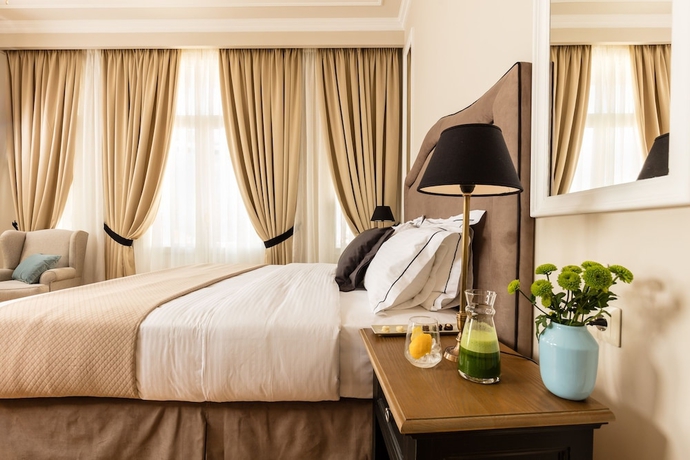 Imagen de la habitación del Hotel Athens Mansion Luxury Suites. Foto 7