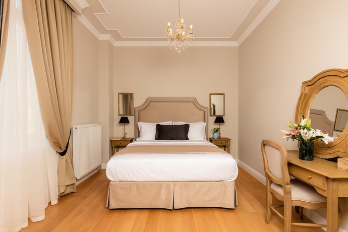 Imagen de la habitación del Hotel Athens Mansion Luxury Suites. Foto 13
