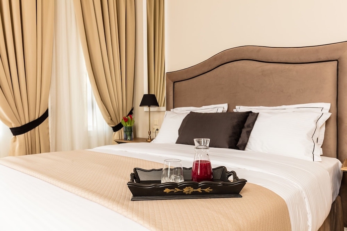 Imagen de la habitación del Hotel Athens Mansion Luxury Suites. Foto 16