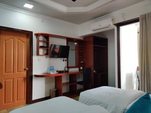 Imagen de la habitación del Hotel Athens View Guraidhoo. Foto 12