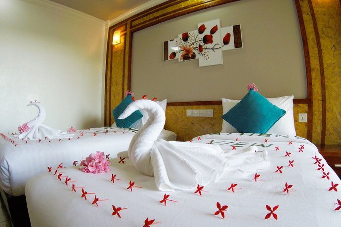 Imagen de la habitación del Hotel Athens View Guraidhoo. Foto 16