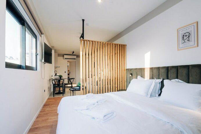 Imagen de la habitación del Hotel Athesense Suites. Foto 13