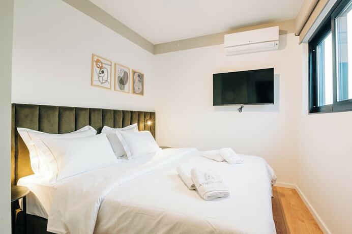 Imagen de la habitación del Hotel Athesense Suites. Foto 15