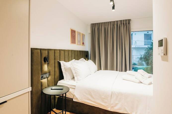 Imagen de la habitación del Hotel Athesense Suites. Foto 16