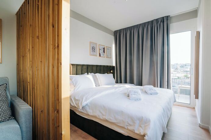 Imagen de la habitación del Hotel Athesense Suites. Foto 17