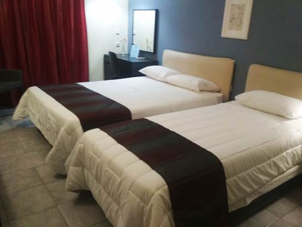 Imagen de la habitación del Hotel Athina City. Foto 7