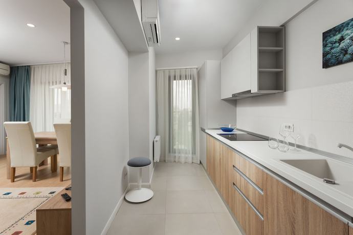 Imagen de la habitación del Hotel Athina Suites. Foto 17