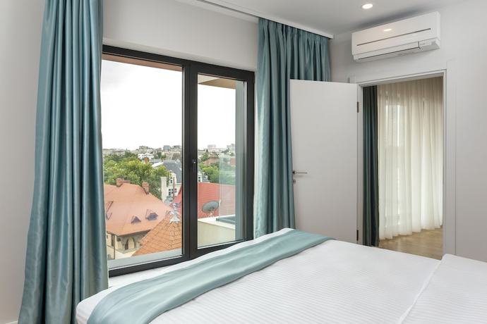 Imagen de la habitación del Hotel Athina Suites. Foto 18