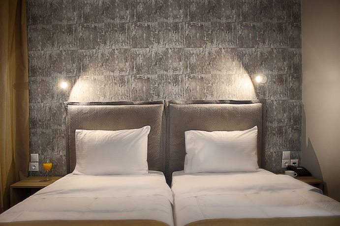 Imagen de la habitación del Hotel Athlos. Foto 12