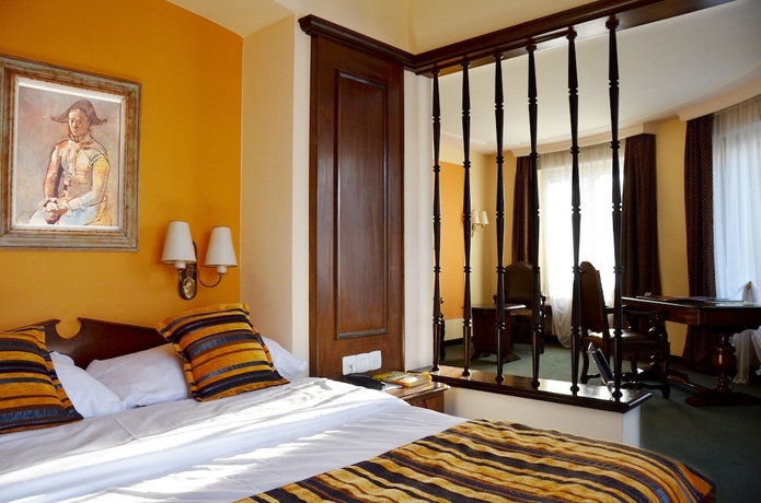 Imagen de la habitación del Hotel Athmos. Foto 13