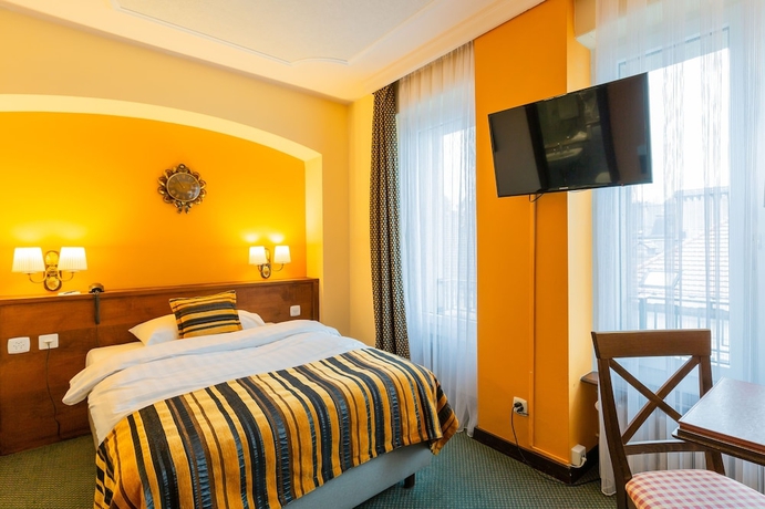 Imagen de la habitación del Hotel Athmos. Foto 14