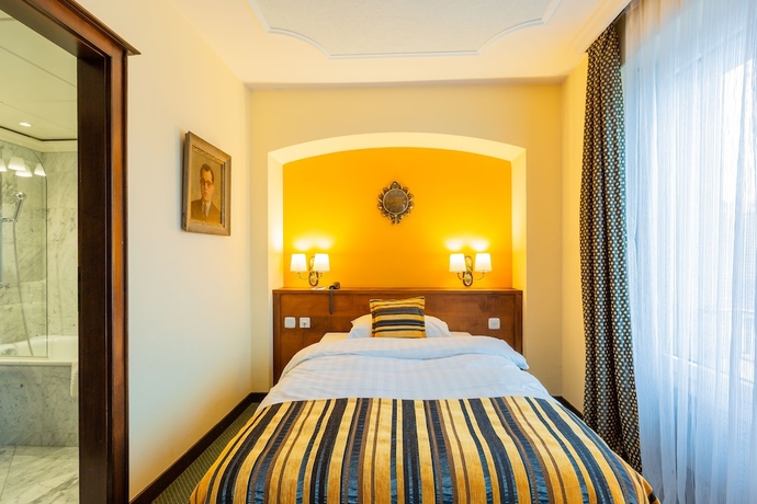 Imagen de la habitación del Hotel Athmos. Foto 15