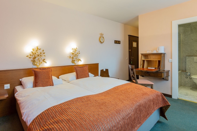 Imagen de la habitación del Hotel Athmos. Foto 16