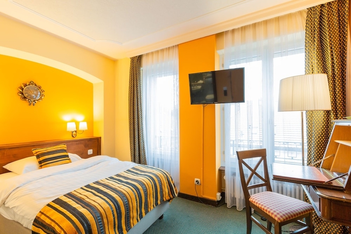 Imagen de la habitación del Hotel Athmos. Foto 18