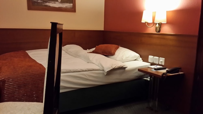 Imagen de la habitación del Hotel Athmos. Foto 19