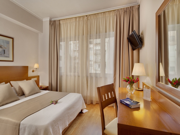 Imagen de la habitación del Hotel Athos. Foto 13