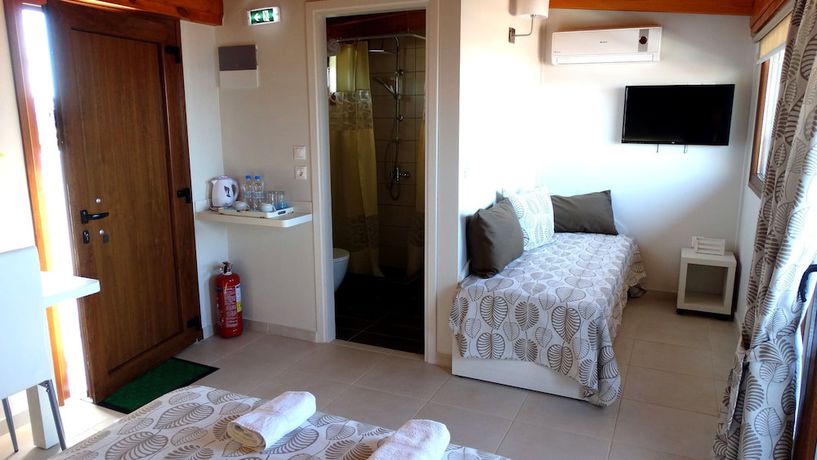 Imagen de la habitación del Hotel Athos Guest House Pansion. Foto 13