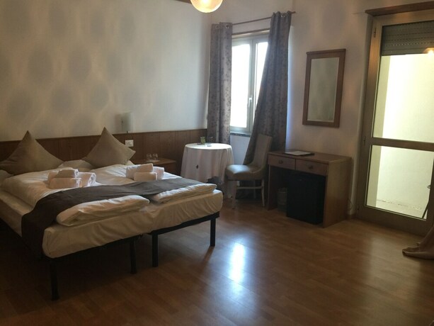 Imagen de la habitación del Hotel Athos, Riva del Garda. Foto 25