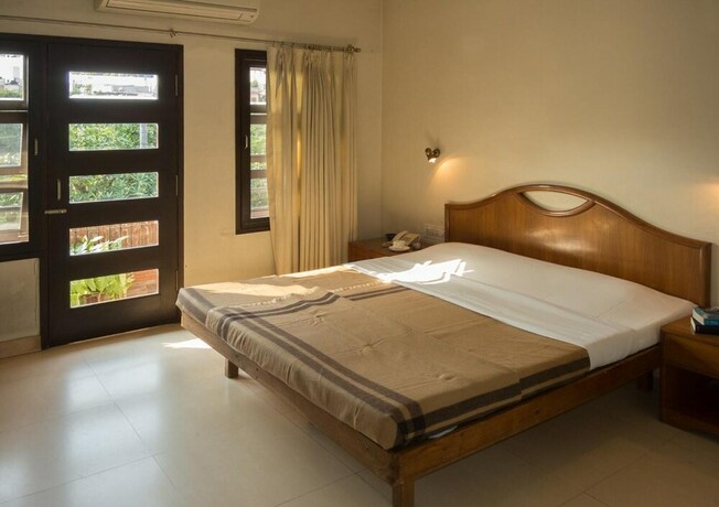 Imagen de la habitación del Hotel Atithi Guest House. Foto 23