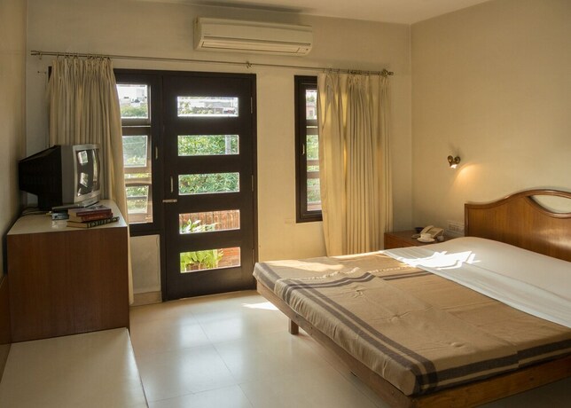 Imagen de la habitación del Hotel Atithi Guest House. Foto 29