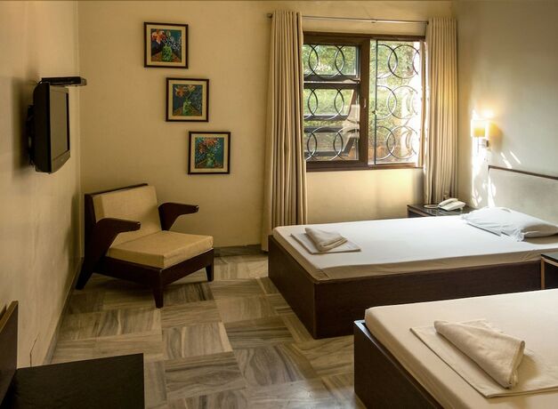 Imagen de la habitación del Hotel Atithi Guest House. Foto 30