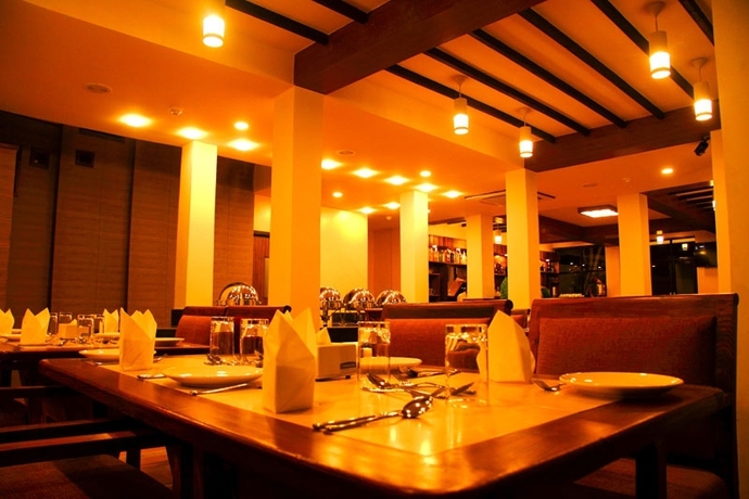 Imagen del bar/restaurante del Hotel Atithi Resort and Spa. Foto 4