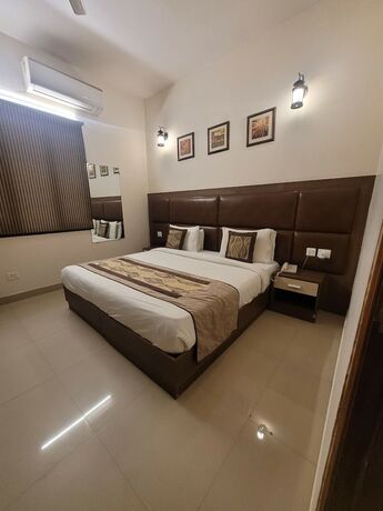 Imagen de la habitación del Hotel Atithi Suites - An Ahg. Foto 18
