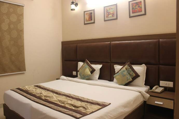 Imagen de la habitación del Hotel Atithi Suites - An Ahg. Foto 20