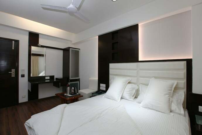 Imagen de la habitación del Hotel Atithi The. Foto 19
