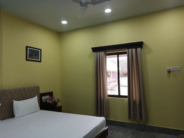 Imagen de la habitación del Hotel Atithya Resort. Foto 15