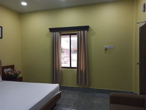 Imagen de la habitación del Hotel Atithya Resort. Foto 17