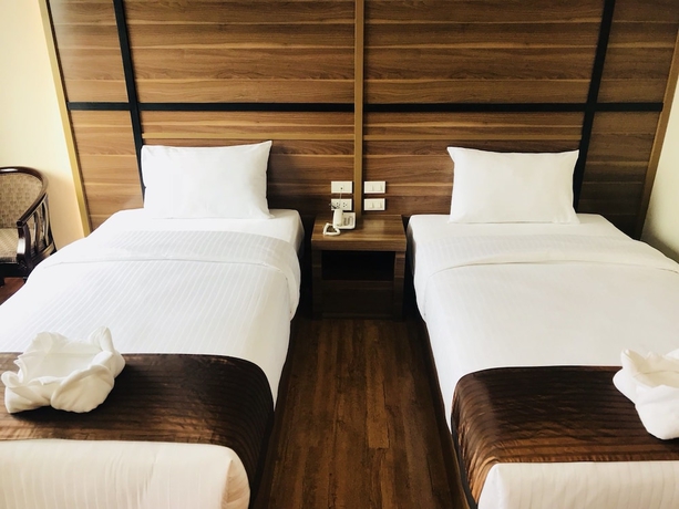 Imagen de la habitación del Hotel Atk Garden Hills. Foto 10