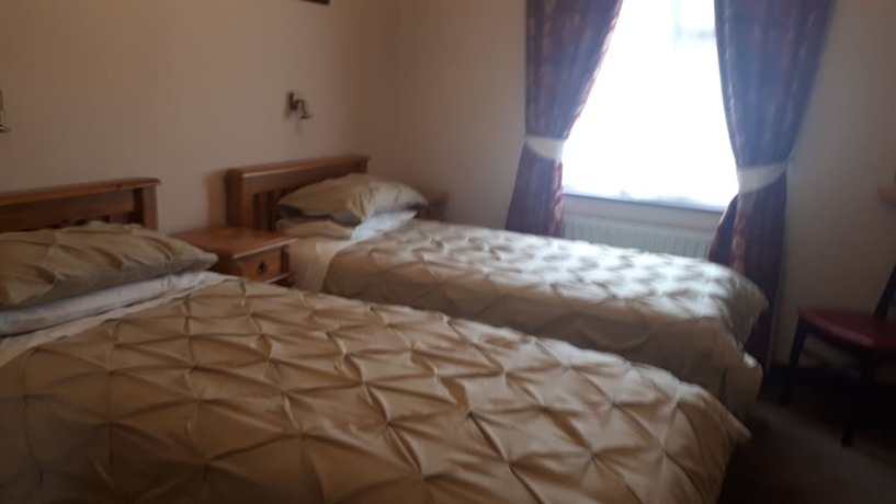 Imagen de la habitación del Hotel Atlantic Guest House. Foto 15