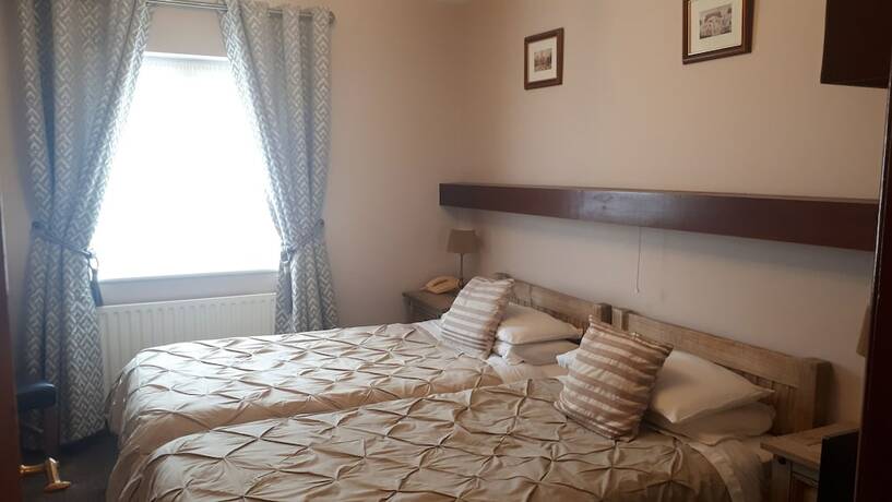 Imagen de la habitación del Hotel Atlantic Guest House. Foto 17