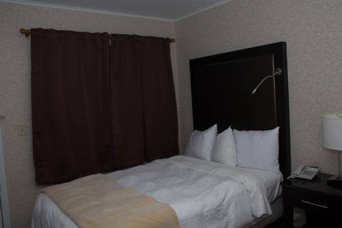 Imagen de la habitación del Hotel Atlantic Inn And Suites - Wall Township. Foto 10