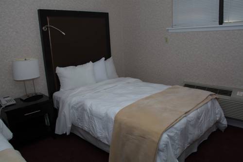 Imagen de la habitación del Hotel Atlantic Inn And Suites - Wall Township. Foto 12