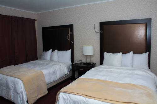 Imagen de la habitación del Hotel Atlantic Inn And Suites - Wall Township. Foto 13