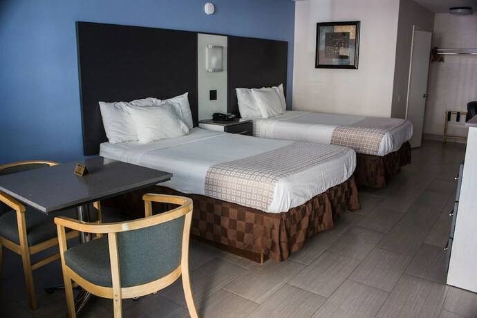 Imagen de la habitación del Hotel Atlantic Ocean Palm Inn. Foto 17