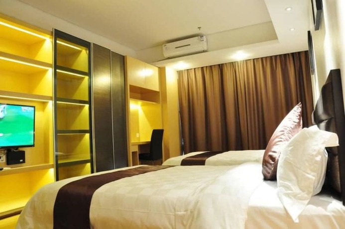 Imagen de la habitación del Hotel Atlantis International Holiday Apartment - Pazhou Guangzhou Tower. Foto 5