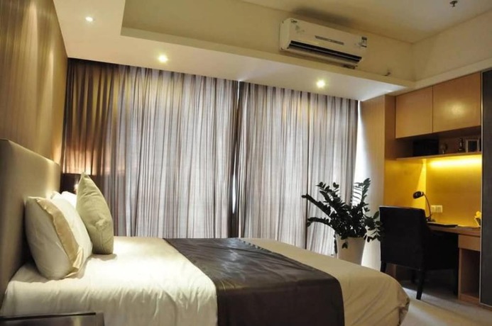 Imagen de la habitación del Hotel Atlantis International Holiday Apartment (luogang Wanda Square). Foto 6
